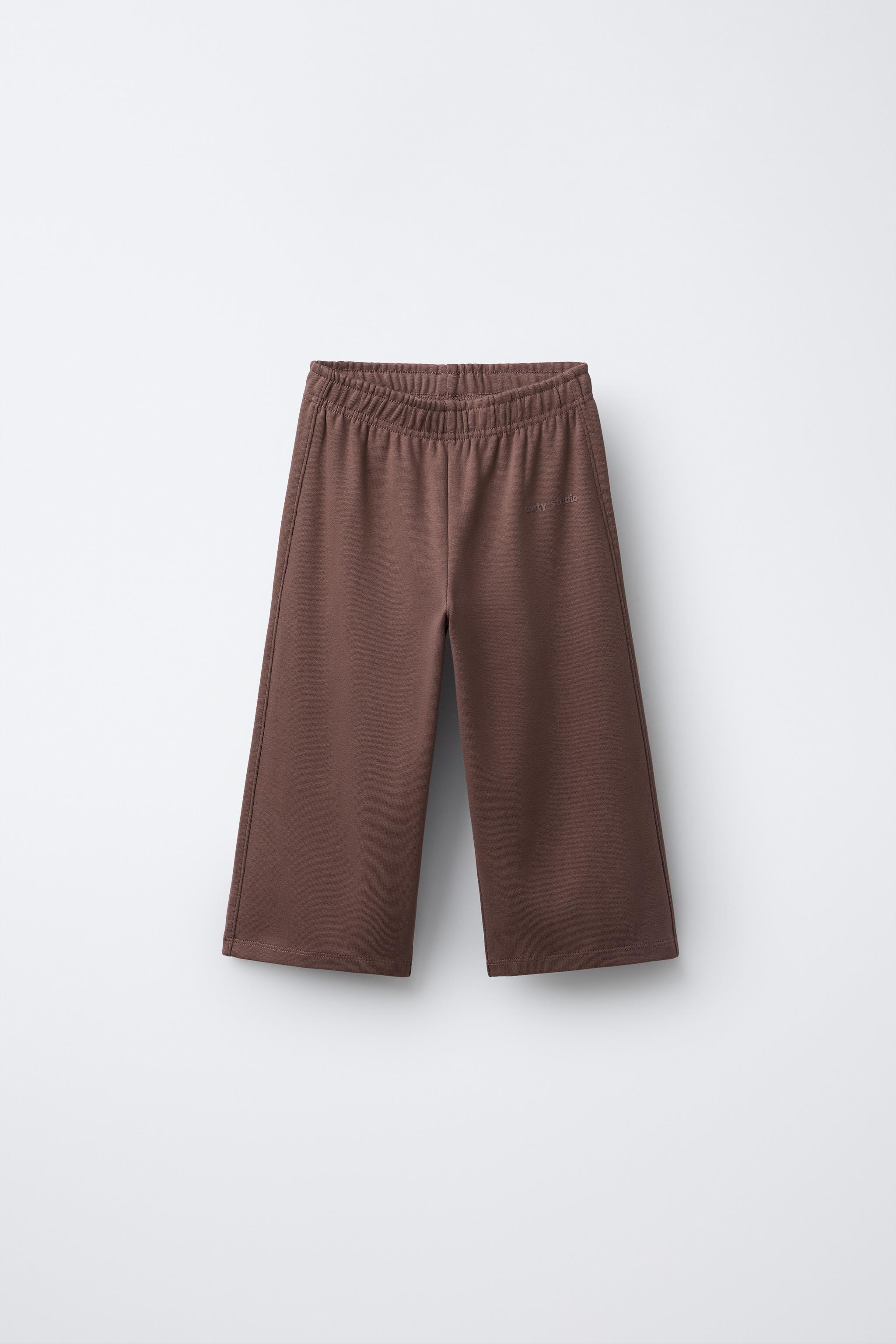 PANTALON EN MOLLETON WIDE LEG INSCRIPTION RELIEF
